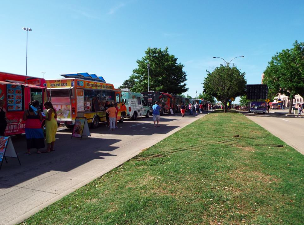 Fans explore the Texas Food Truckin' Fest in Arlington, TX.